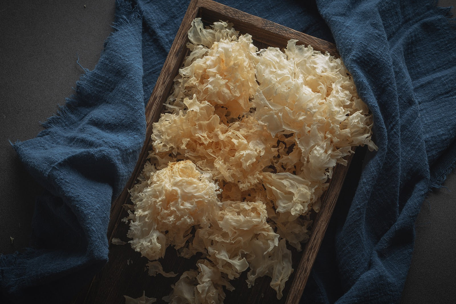 Tremella Mushrooms in a wooden box.
